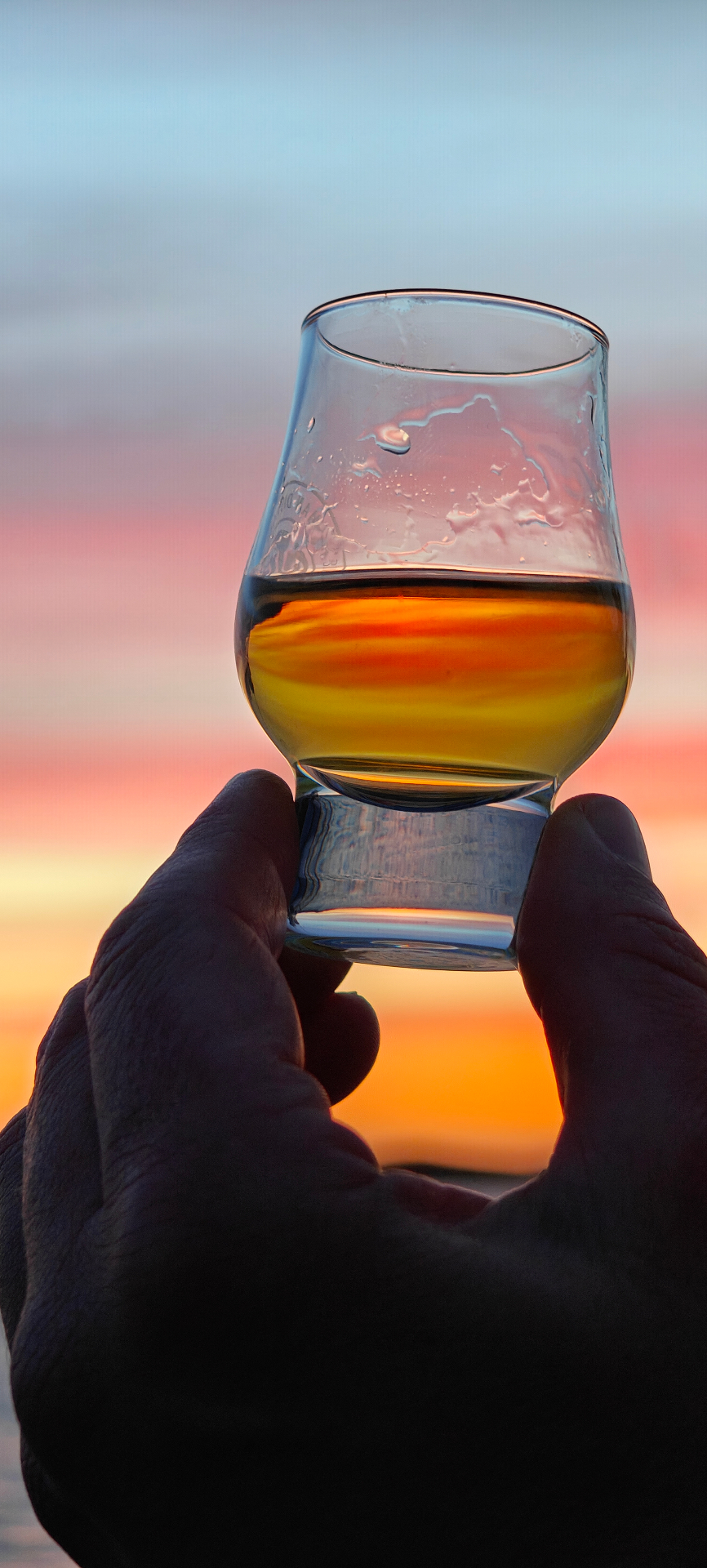 Zonsondergang, in glas gevangen